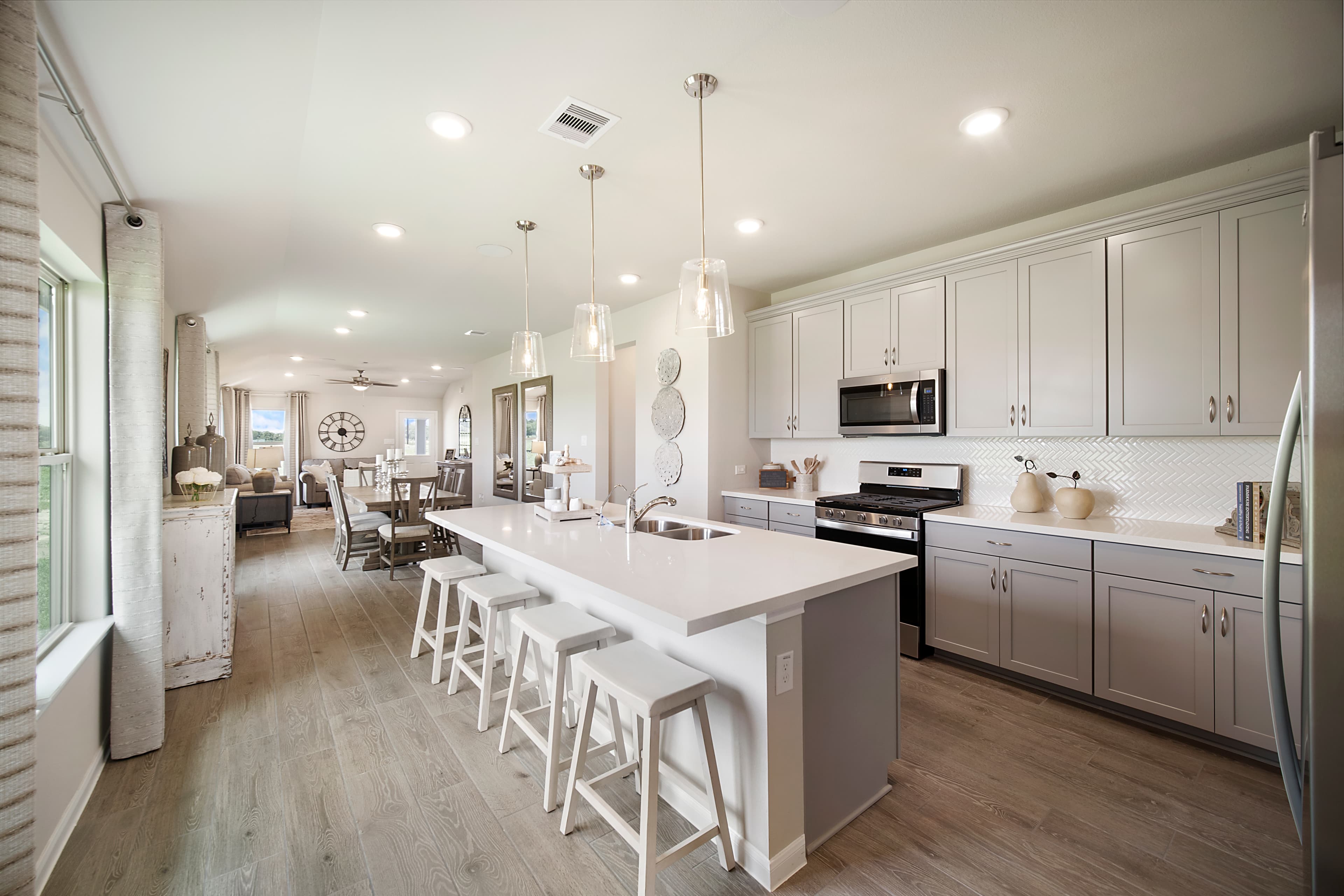 kitchen with large island and white cabinets 