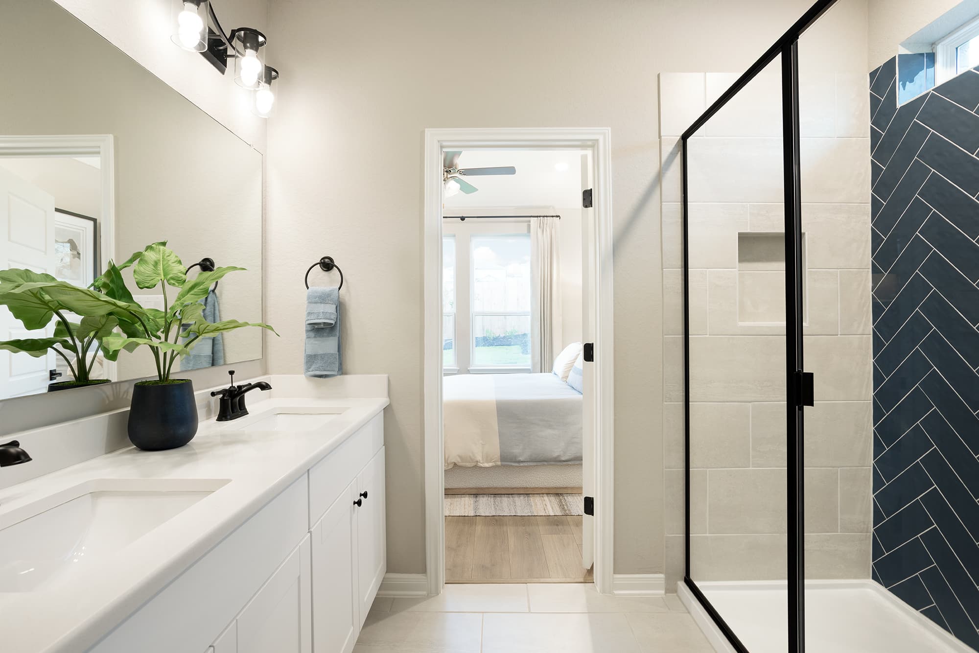 bathroom with tile flooring & a walk-in shower