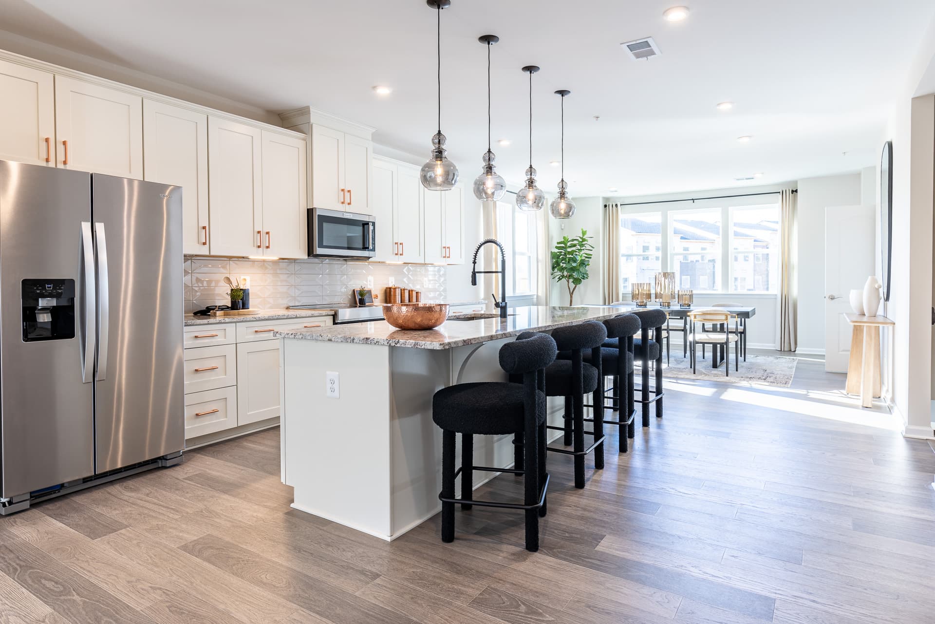 kitchen with large center island and barstools