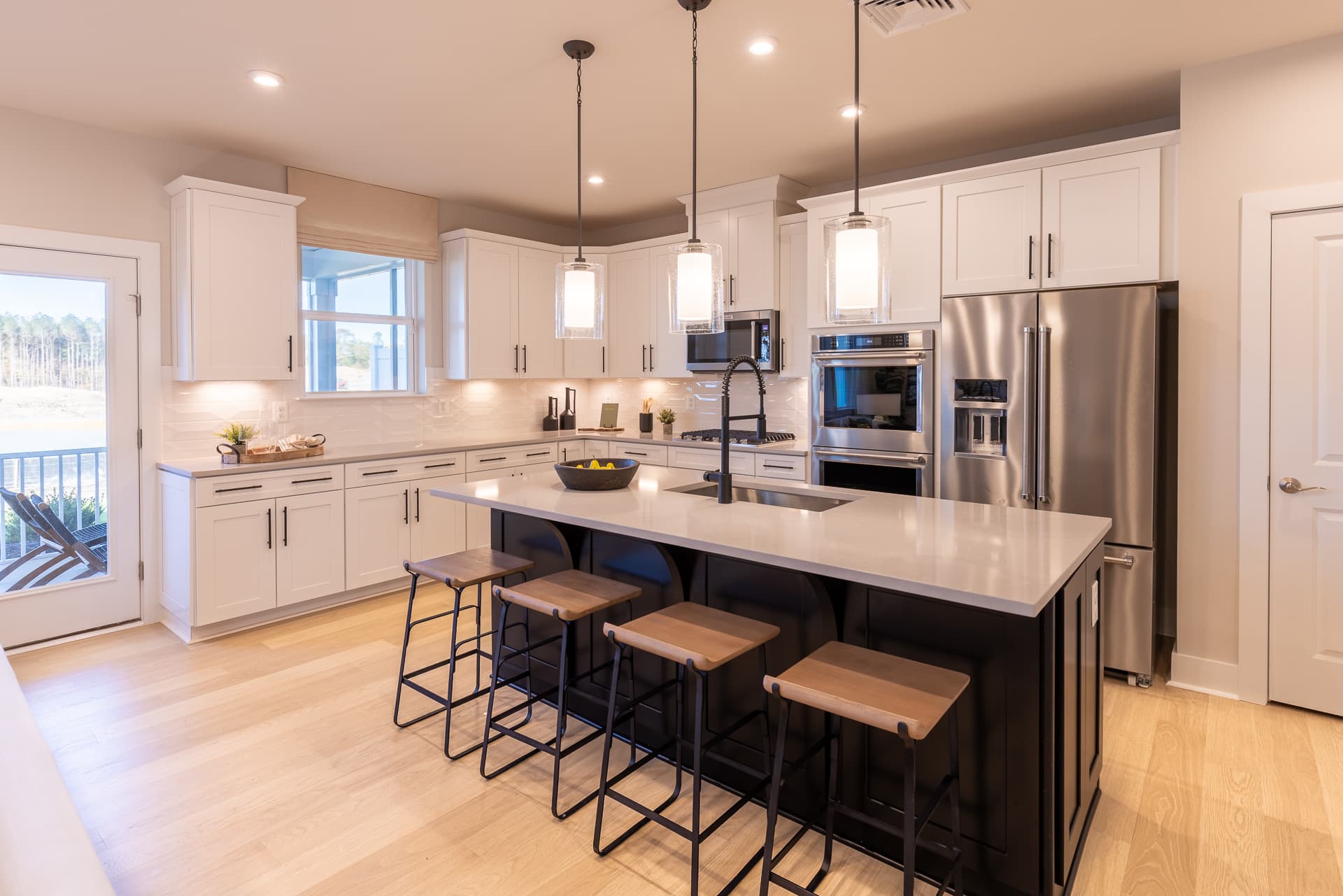 kitchen with statement center island and stainless steel appliances