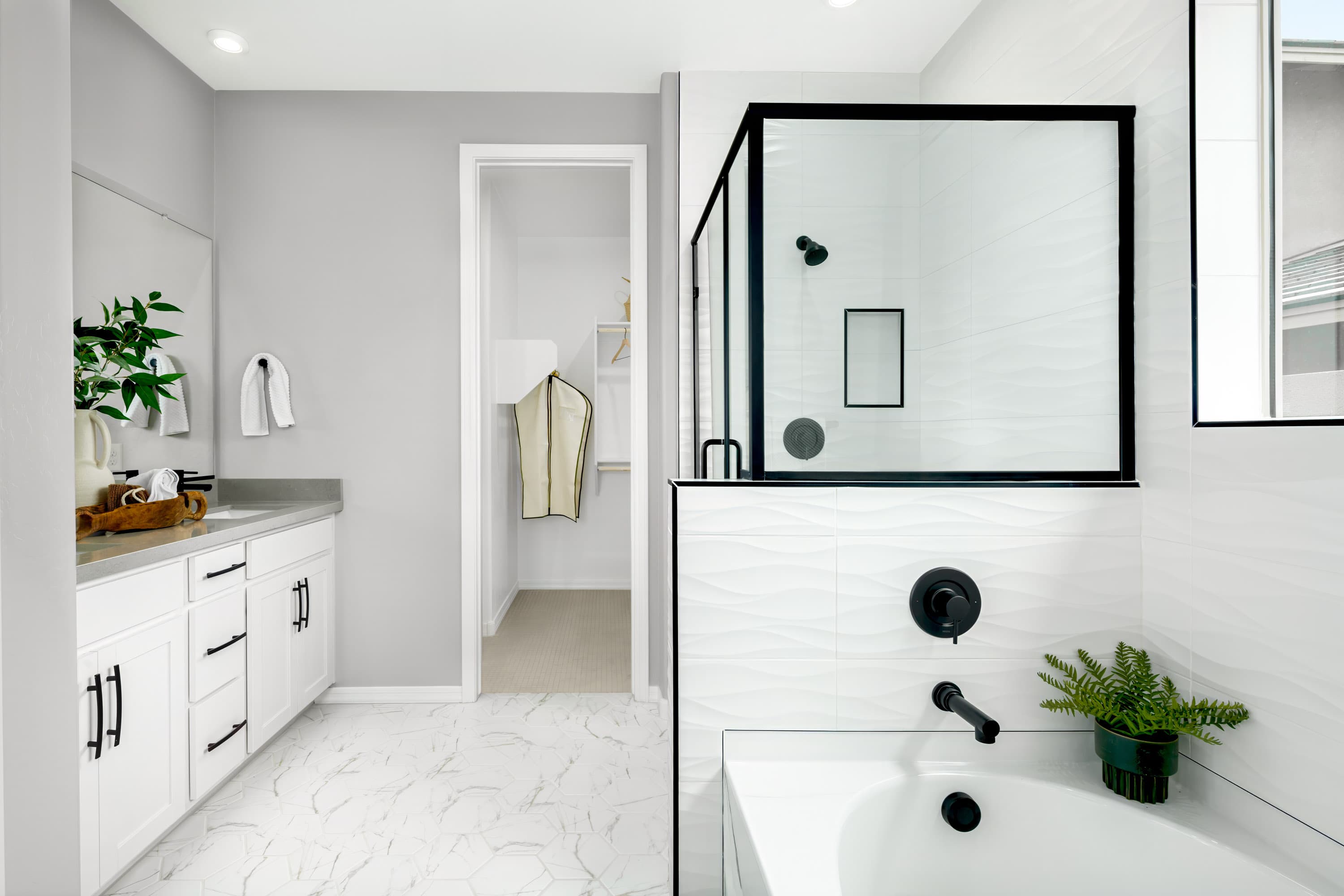 large bathroom with shower and window