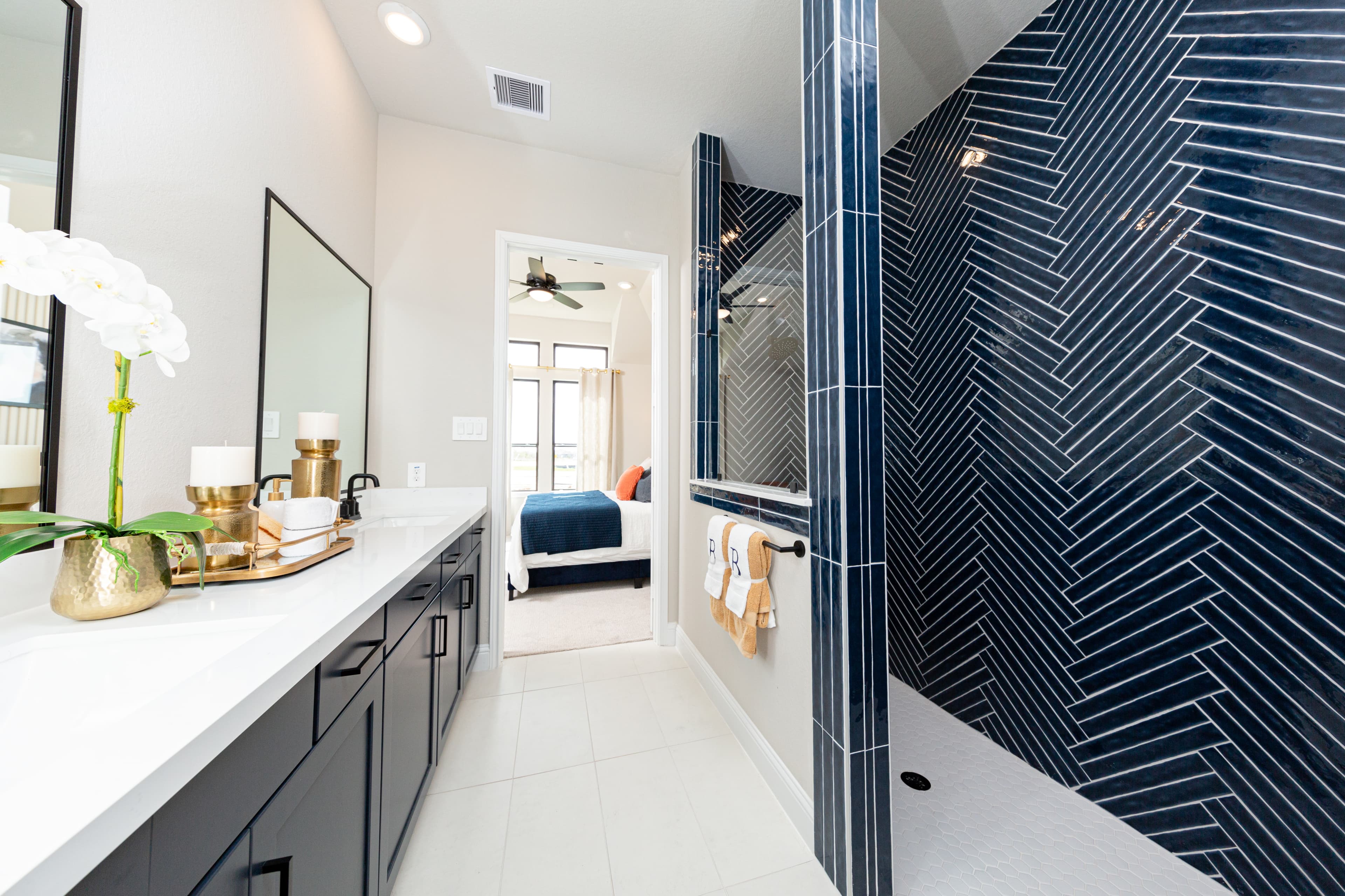 master bathroom with navy blue tile
